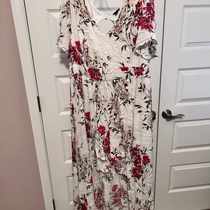 Torrid white romper w/ floral